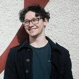 Russell Hooton-Fox was welcomed back to Media Design School in 2023 as the guest speaker for the Graduation Ceremony