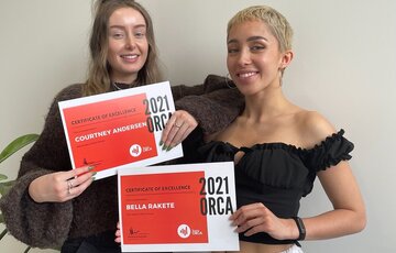 Courtney and Bella hold their 2021 ORCA certificates